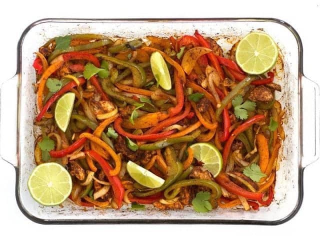 These Easy Oven Fajitas are a simple "set it and forget it" way to get that smoky sweet flavor of traditional griddle fajitas. BudgetBytes.com