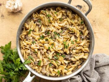 Overhead view of a pan full of beef and mushroom stroganoff