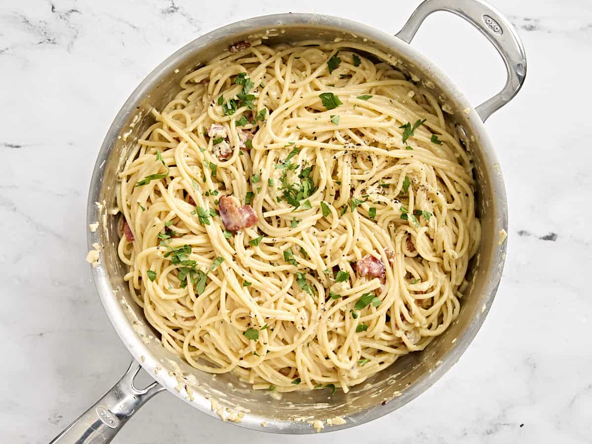 Spaghetti carbonara in a skillet.