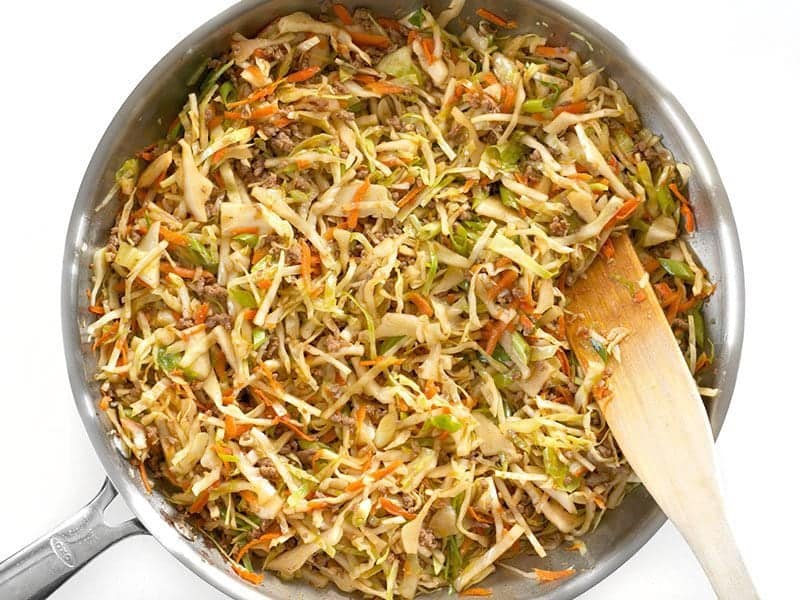 Mix in Green Onion into Beef and Cabbage Stir Fry