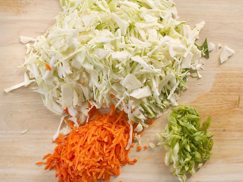 Shredded cabbage and carrot, sliced green onion