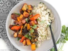 Harissa Roasted Vegetables are a spicy, slightly sweet, and smoky vegetable medley that makes a great side for meat or fish. BudgetBytes.com