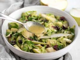 This Warm Brussels Sprouts and Pear Salad combines winter flavors in a warm and filling side dish. BudgetBytes.com