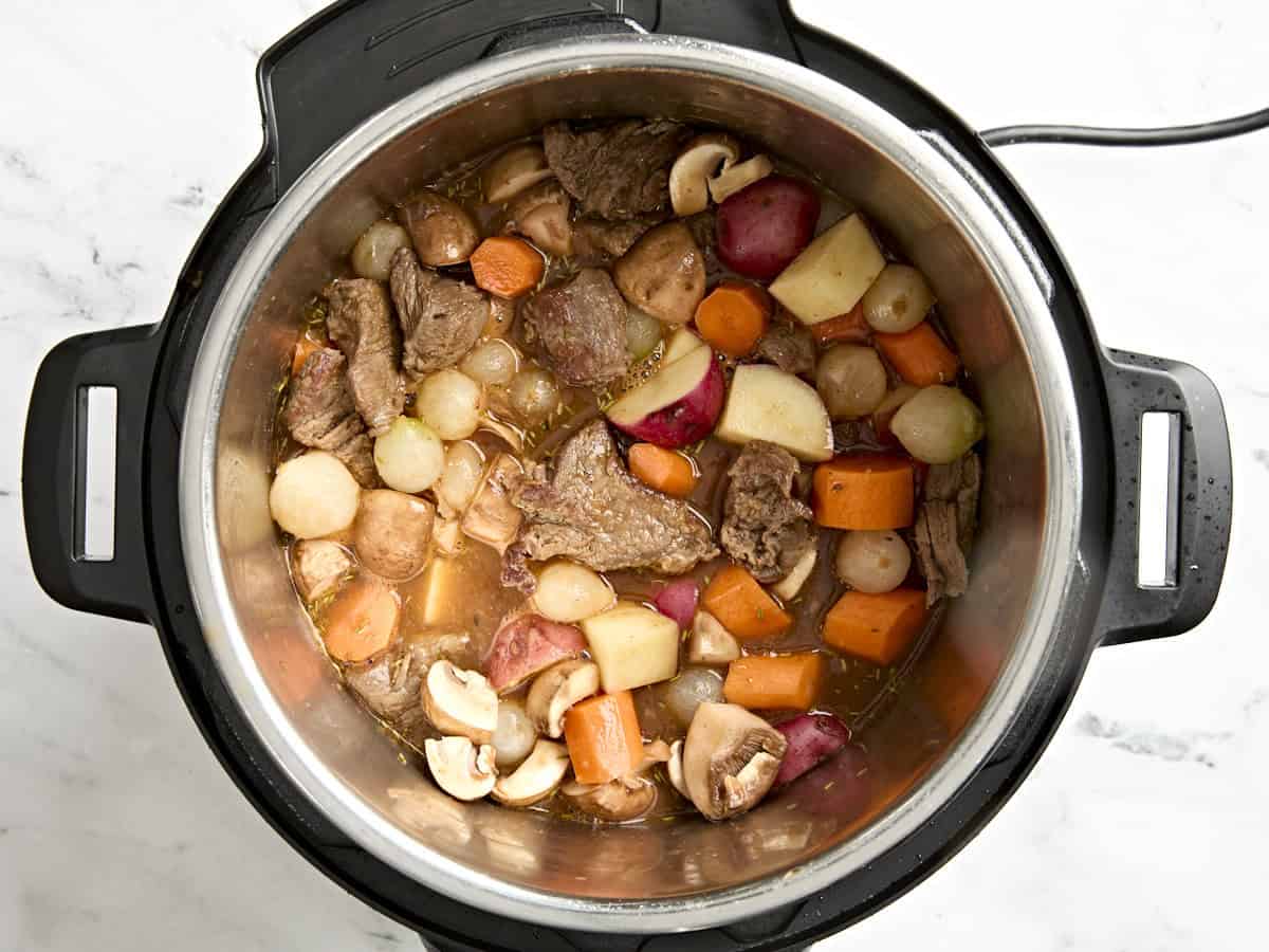 Prepared ingredients for Instant Pot beef stew in an Instant Pot.