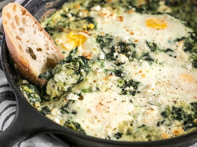 Baked Eggs With Creamy Greens, Mushrooms, and Cheese Recipe