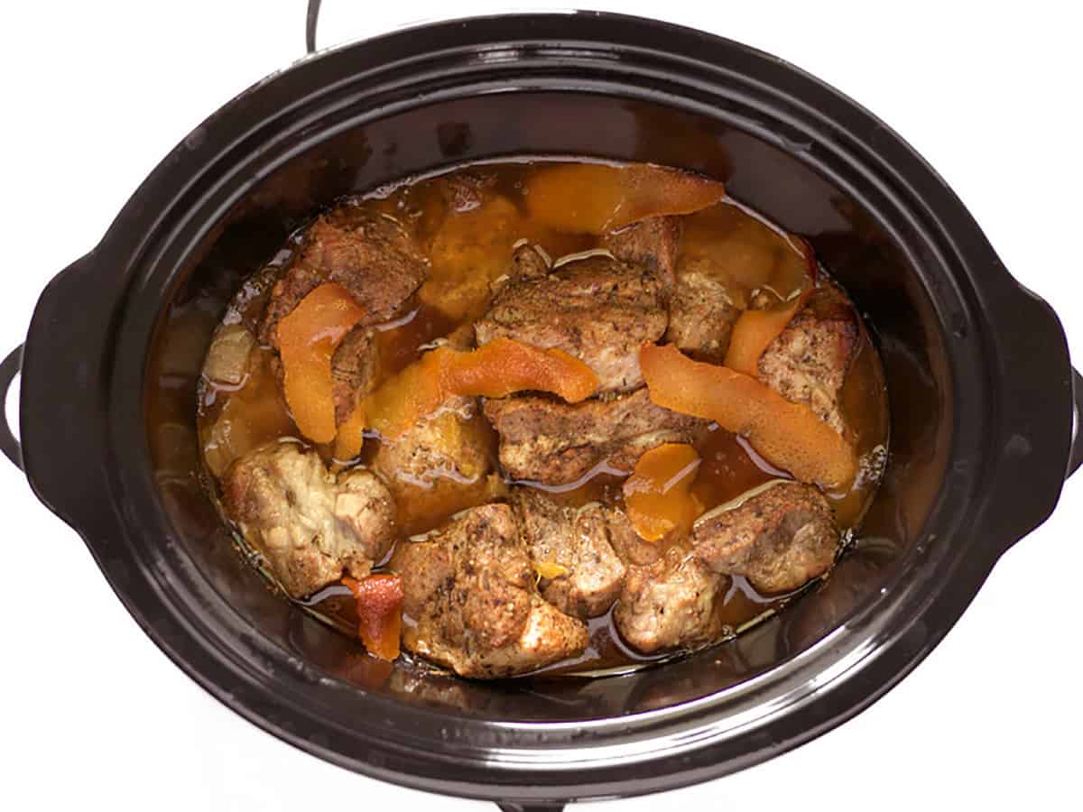 Cooked carnitas in the slow cooker.