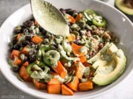 These Sweet Potato Grain Bowls with Green Tahini Sauce are prefect for meal prep and bursting with color, texture, and flavor! BudgetBytes.com