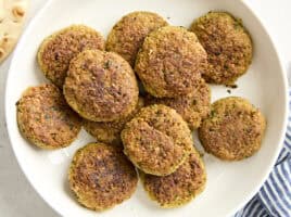 Overhead view of falafel on a plate.