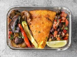 This smoky chipotle portobello fajita meal prep features mixed fajita vegetables, sweet potato cornbread, and cowboy caviar for a filling vegetarian meal! BudgetBytes.com