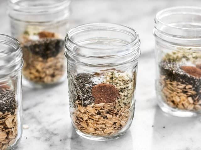 Preparing individual oat packs with seeds, seasoning, and other add-ins, like these Make Ahead Seeded Oats, makes having a healthy breakfast fast and easy. BudgetBytes.com