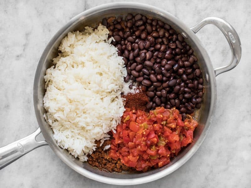 Add Cooked Rice Beans Tomatoes