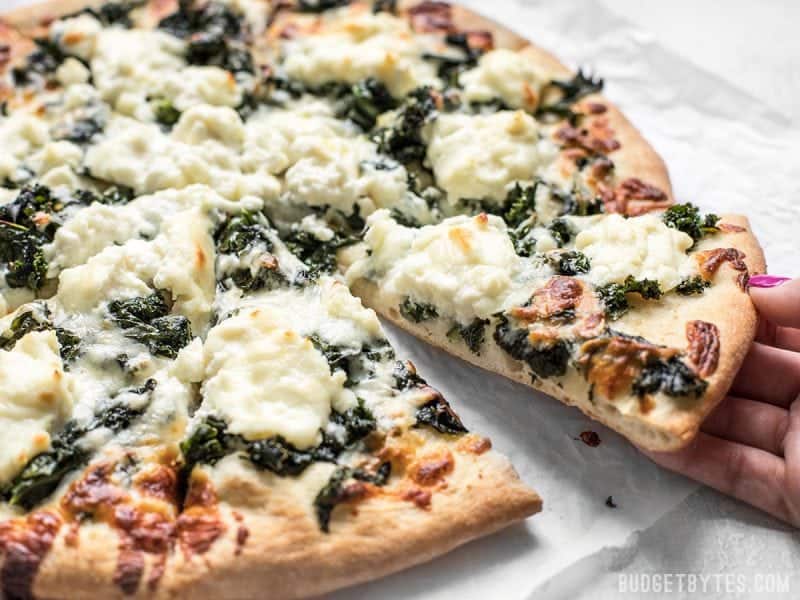 https://www.budgetbytes.com/wp-content/uploads/2018/05/Garlicky-Kale-and-Ricotta-Pizza-slice.jpg