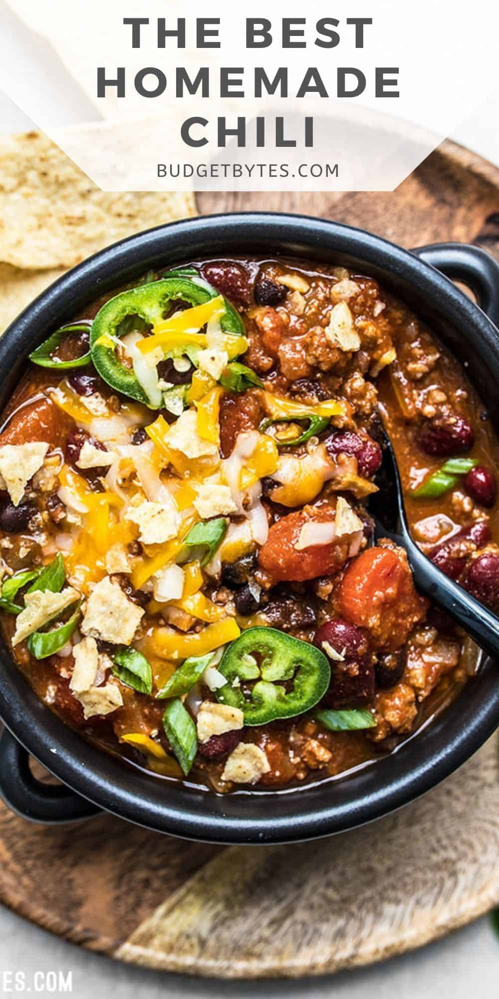 Overhead view of a bowl of chili with toppings, title text at the top