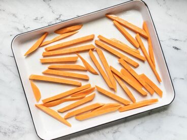 Baked Sweet Potato Fries with Peanut Lime Dressing - Budget Bytes