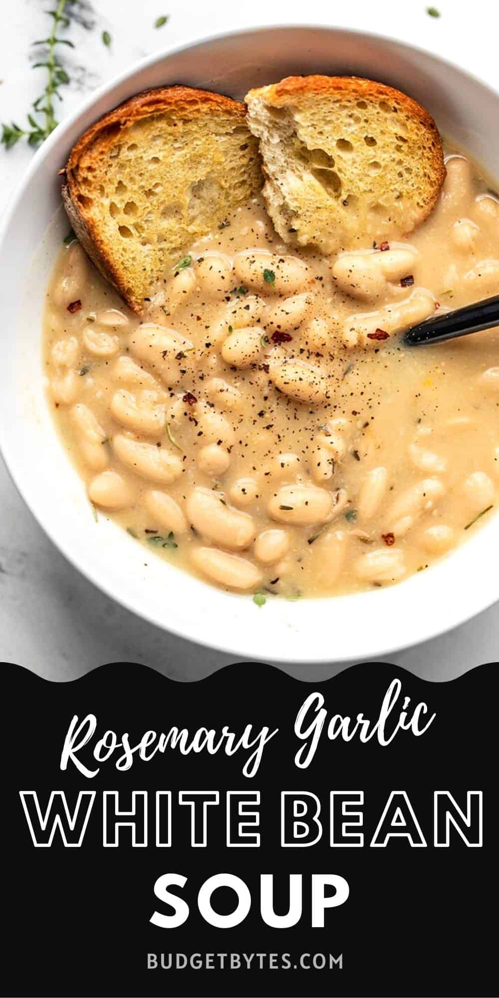 close up of a bowl of white bean soup with garlic toast in the side of the bowl