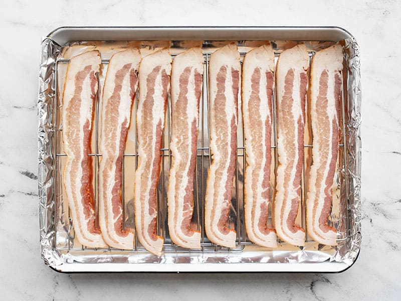 https://www.budgetbytes.com/wp-content/uploads/2020/01/Line-up-Raw-Bacon-on-Wire-Rack.jpg