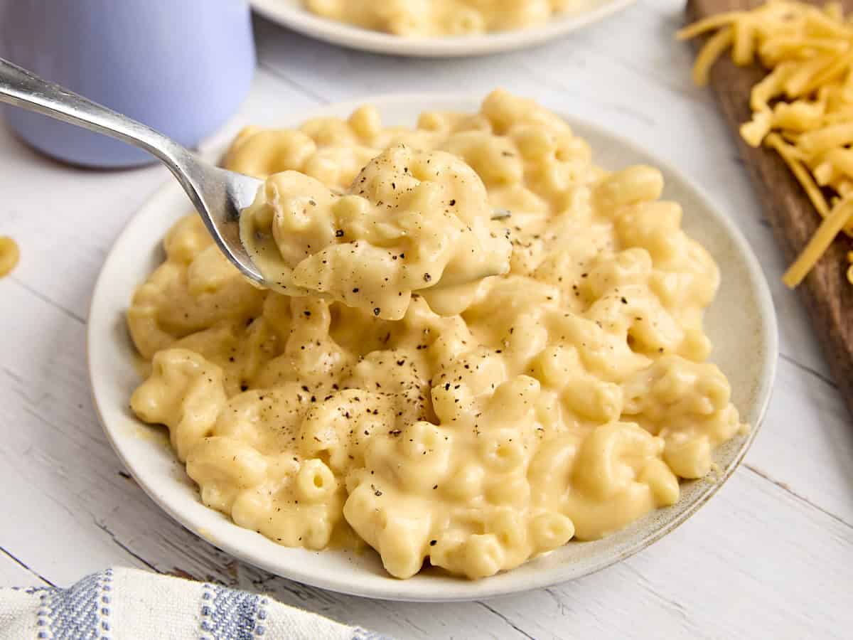 Side view of a plate of mac and cheese.