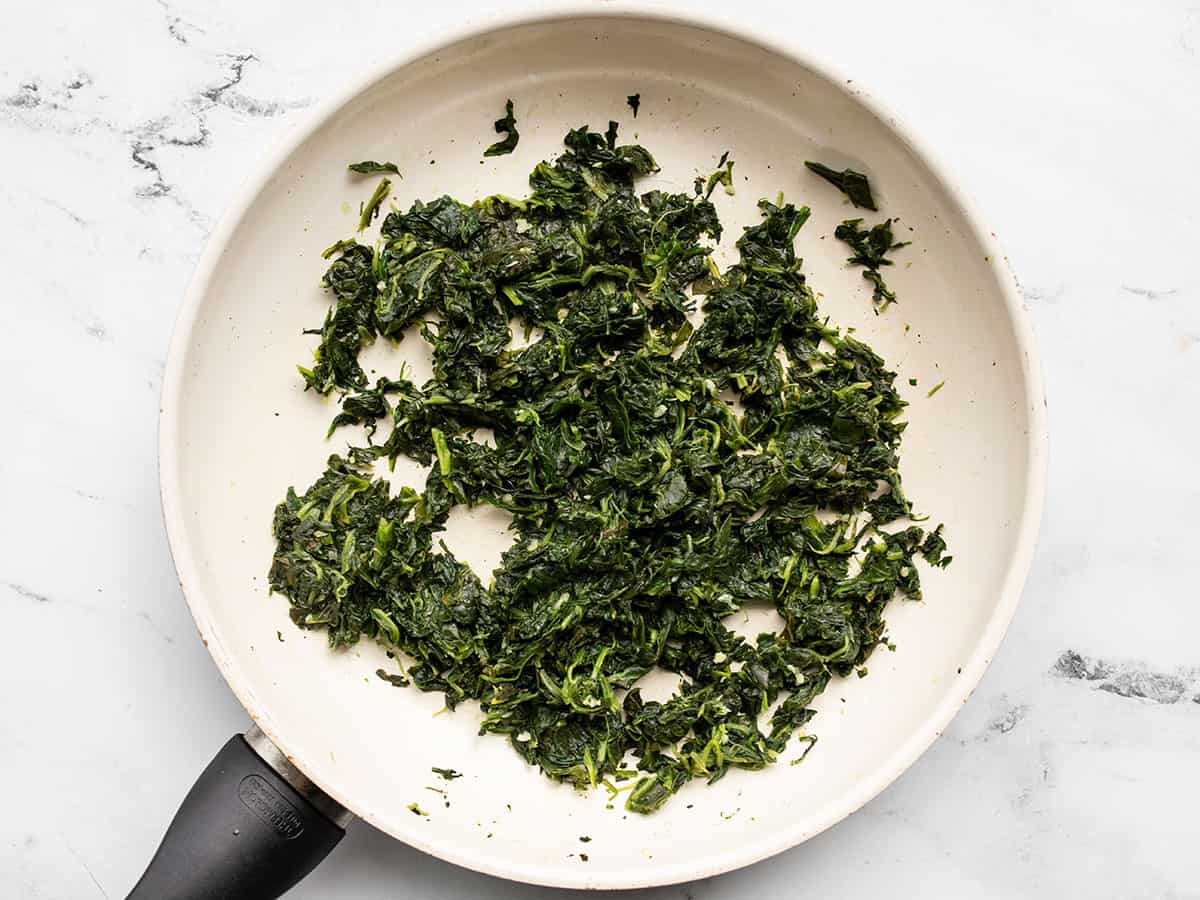 cooked spinach in a skillet