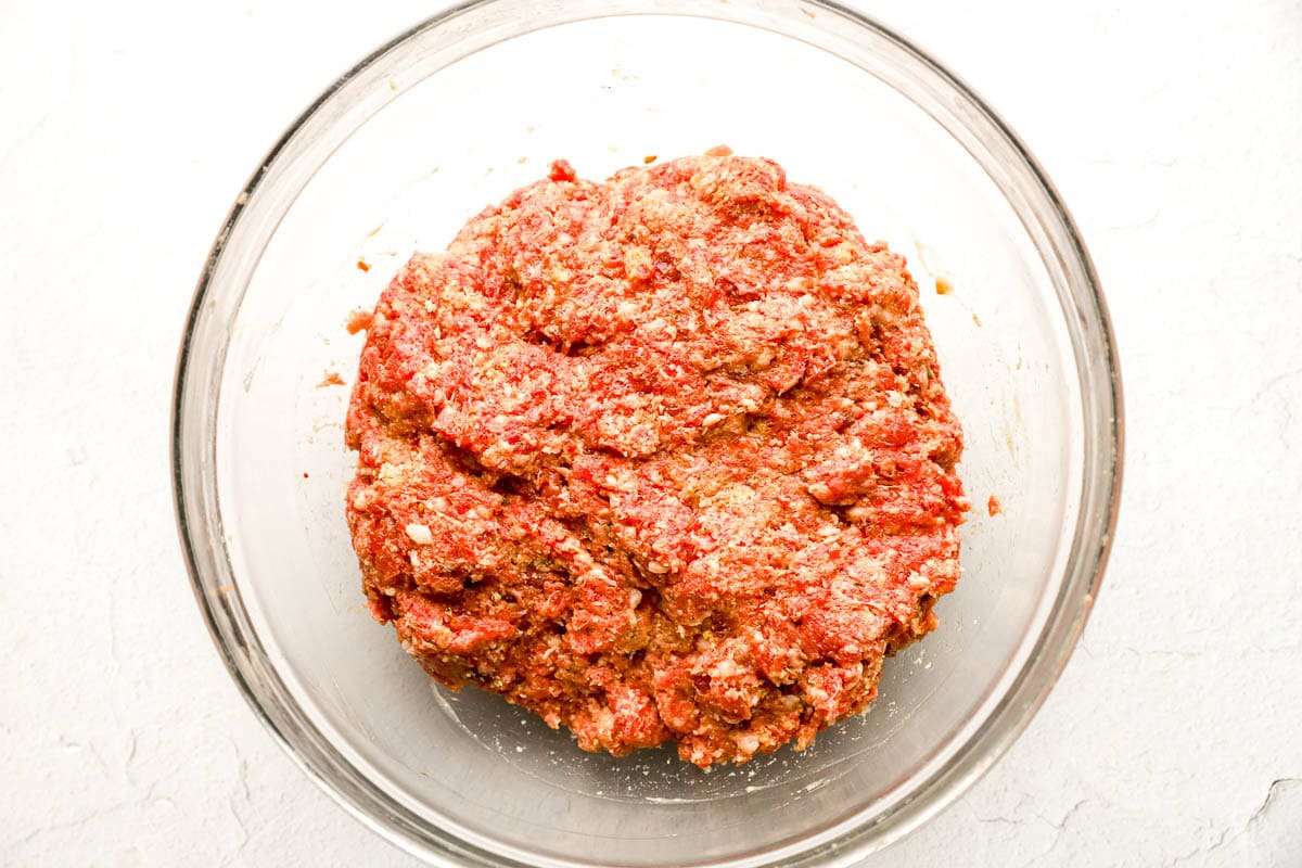 Ground beef and italian sausage mixture in a bowl.