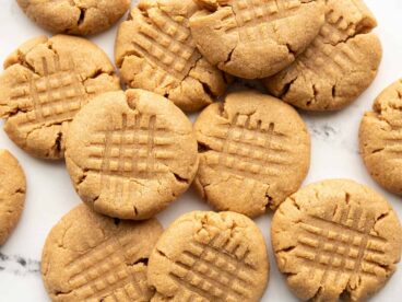 https://www.budgetbytes.com/wp-content/uploads/2022/02/Flourless-Peanut-Butter-Cookies-spill-368x276.jpg