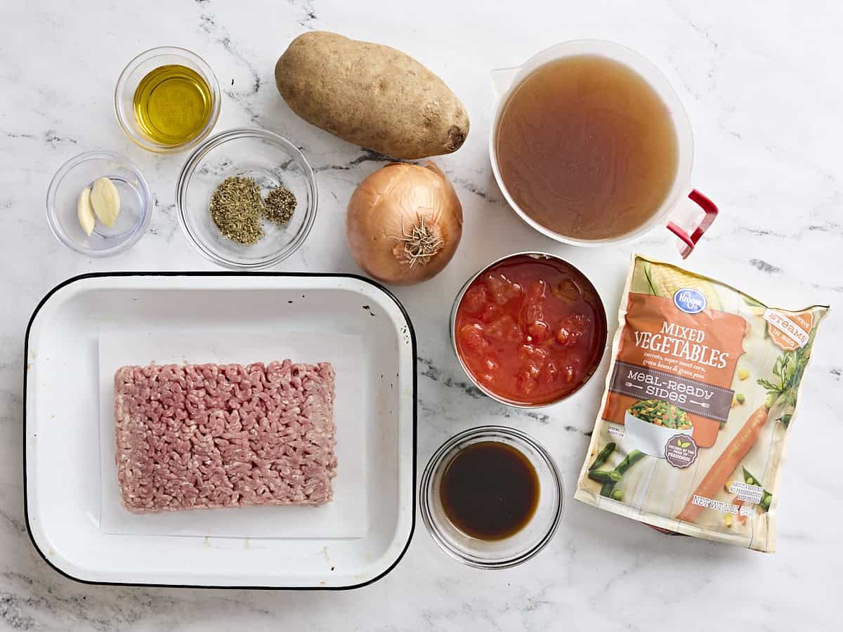 Overhead view of the ingredients for beef and vegetable soup.