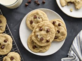 Overhead view of chocolate chip cookies on a plate.