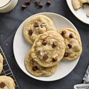 Overhead view of chocolate chip cookies on a plate.