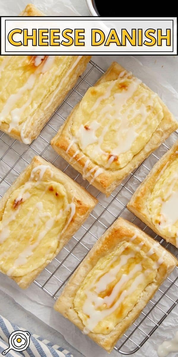 Overhead shot of cheese danish on a cooling rack.