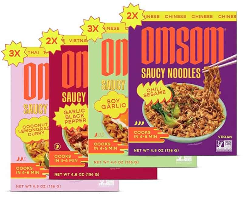 Four packages of different flavored ramen noodle kits. 