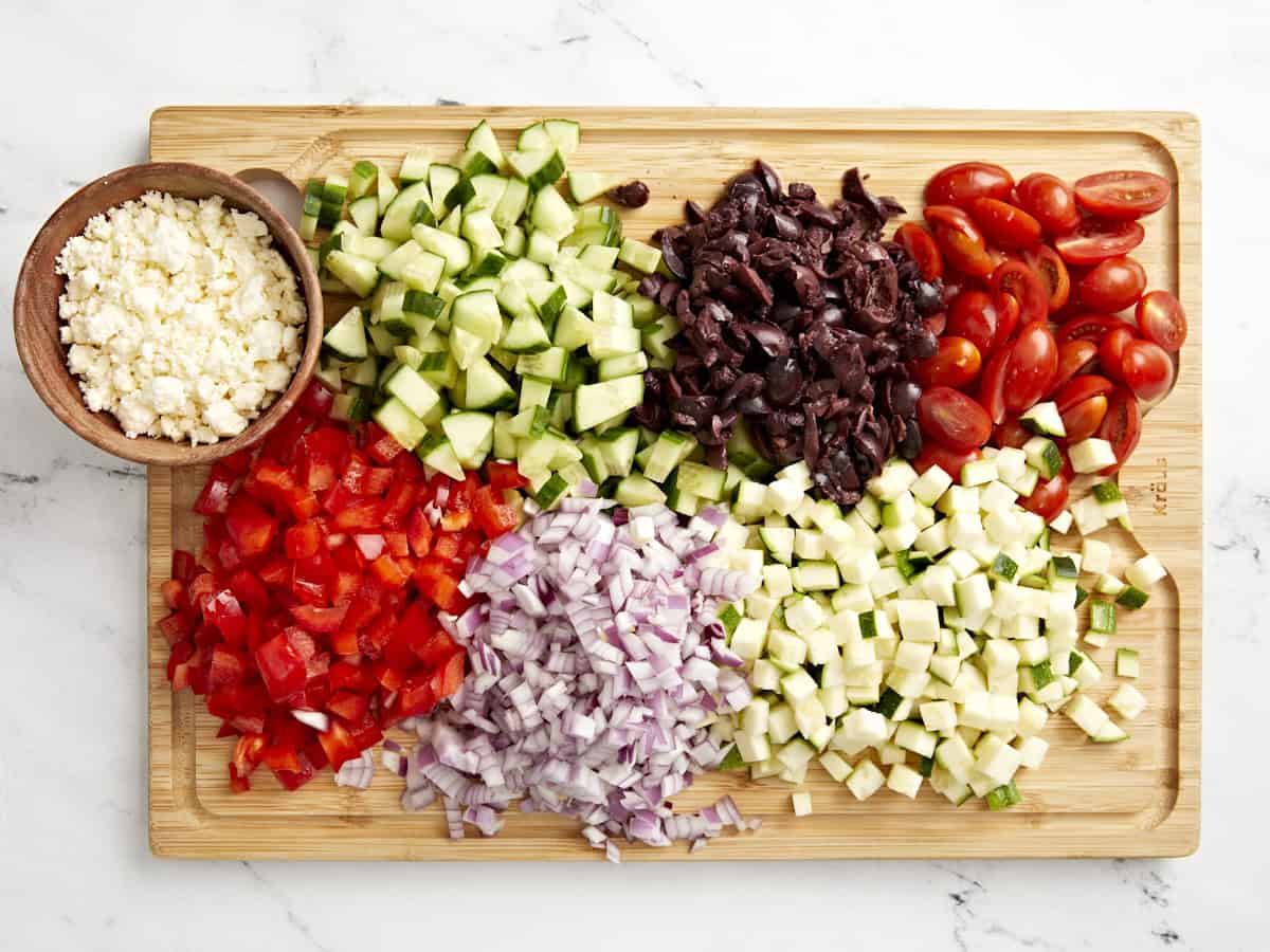 diced vegetables on a cutting board.