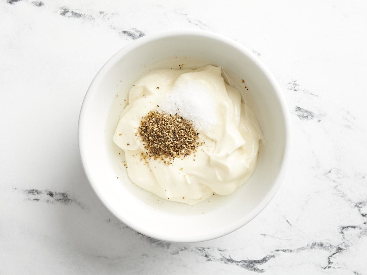 Ingredients for chicken salad dressing in a bowl.