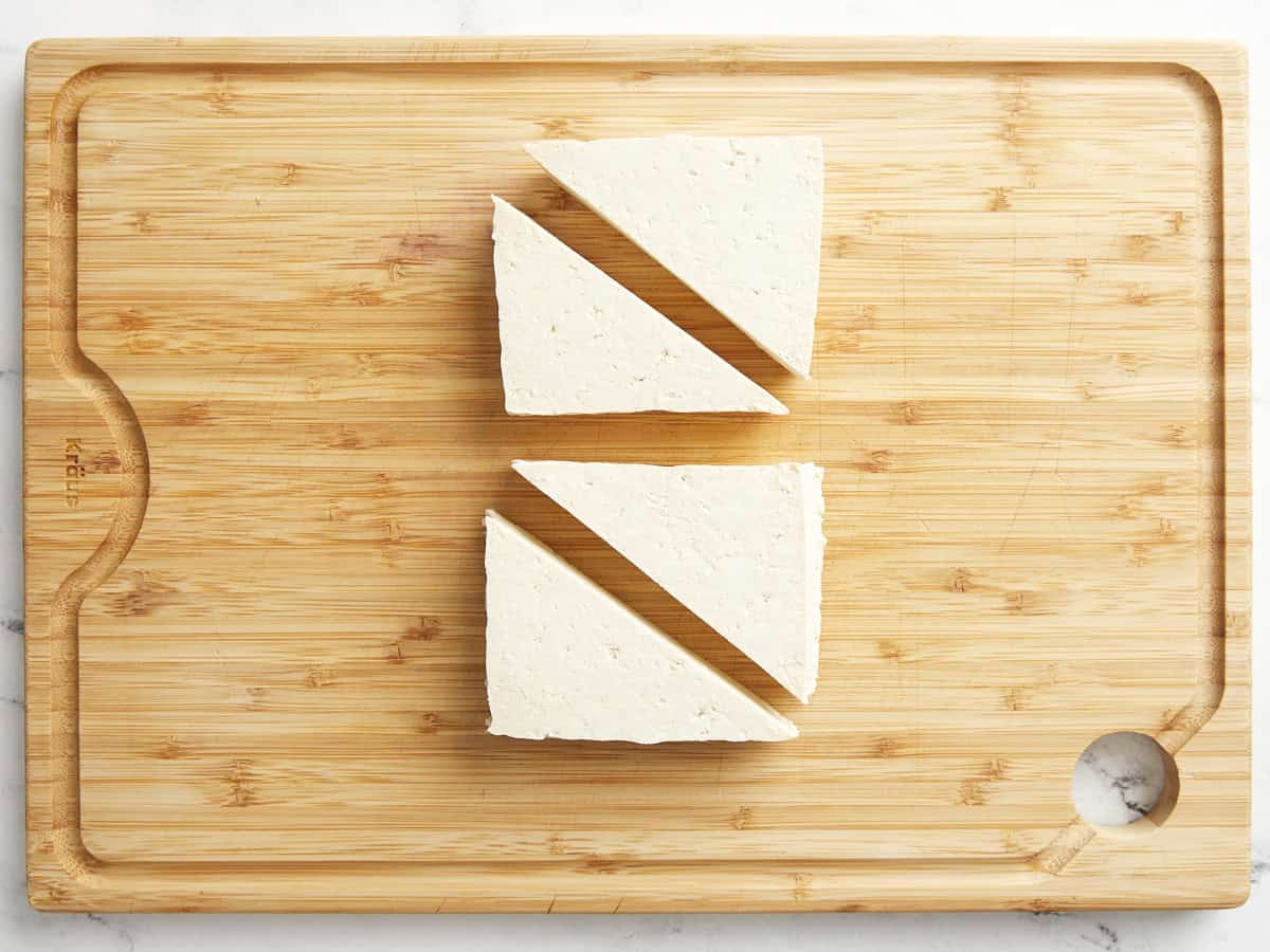 Tofu cut into triangles.