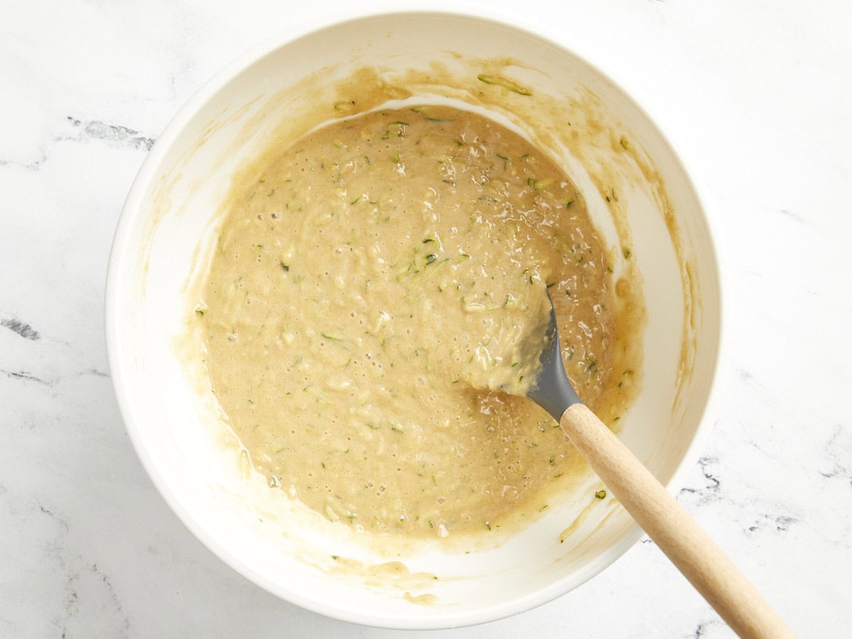 Zucchini bread batter in a large bowl.