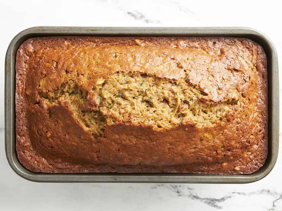 Cooked zucchini bread in a loaf pan.