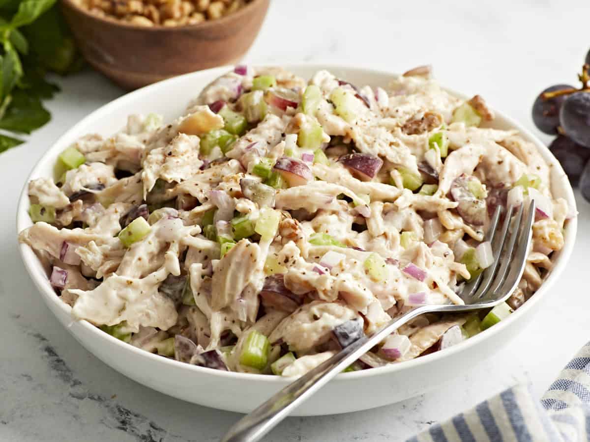 Side view of traditional chicken salad in a bowl.