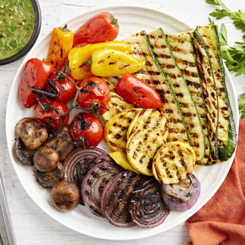 Overhead view of a plate of grilled vegetables.