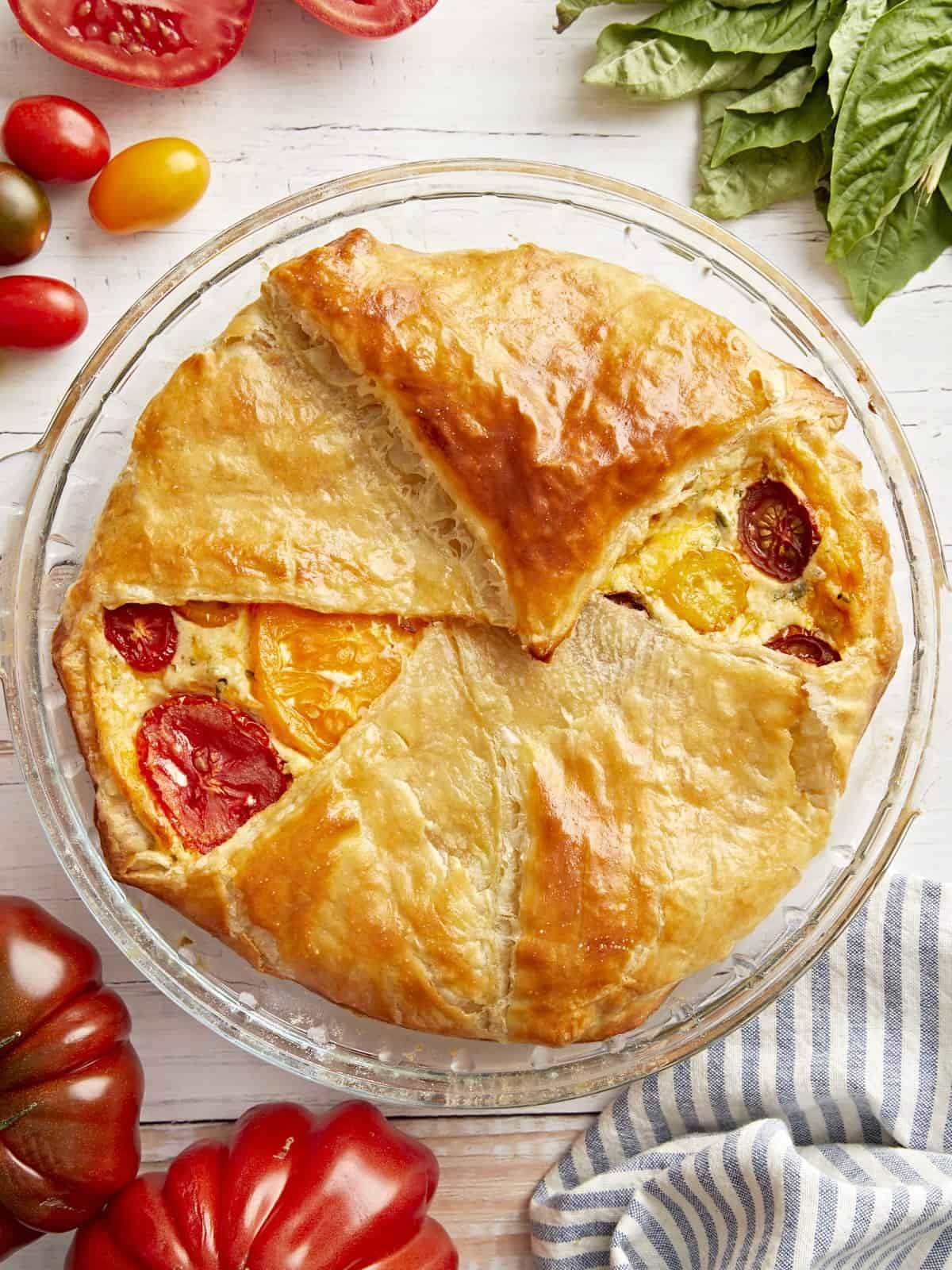 Tomato pie in a baking dish.