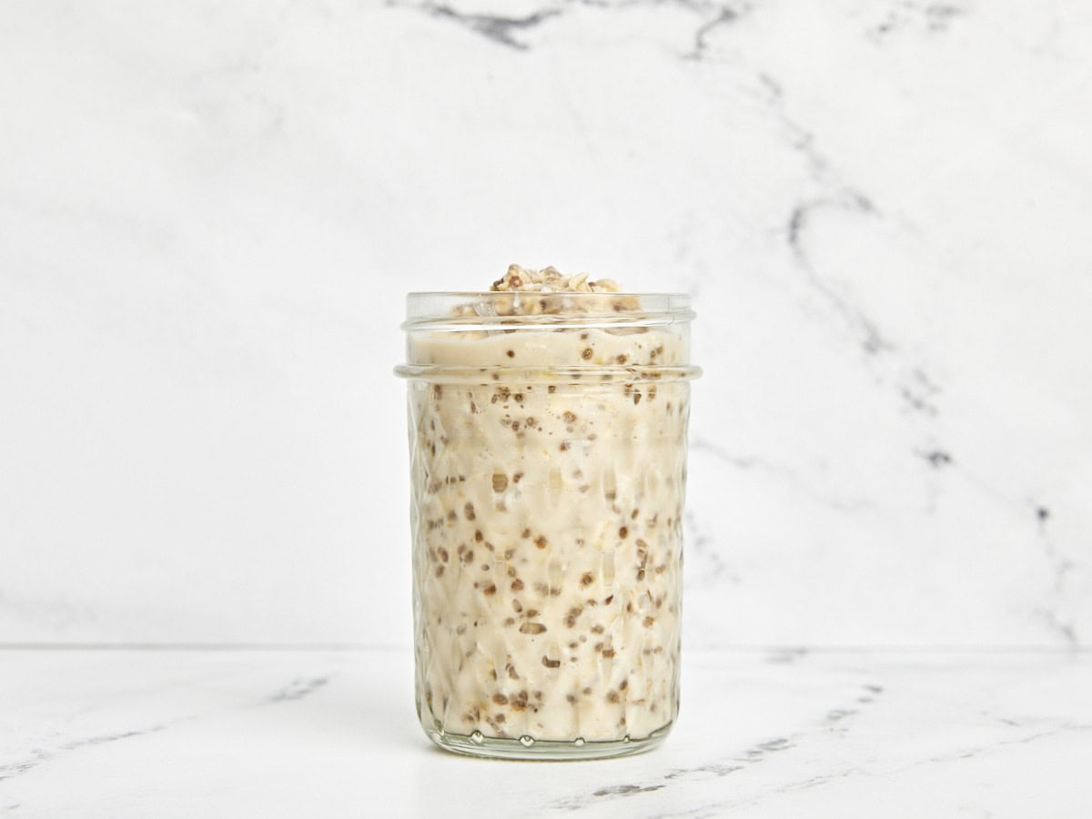 Overnight oats in a mason jar after being refrigerated