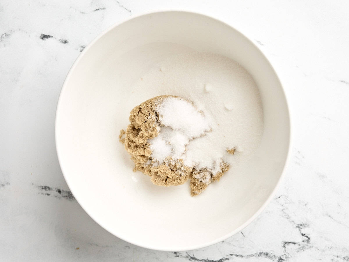 Dry ingredients for butter tarts in a mixing bowl.