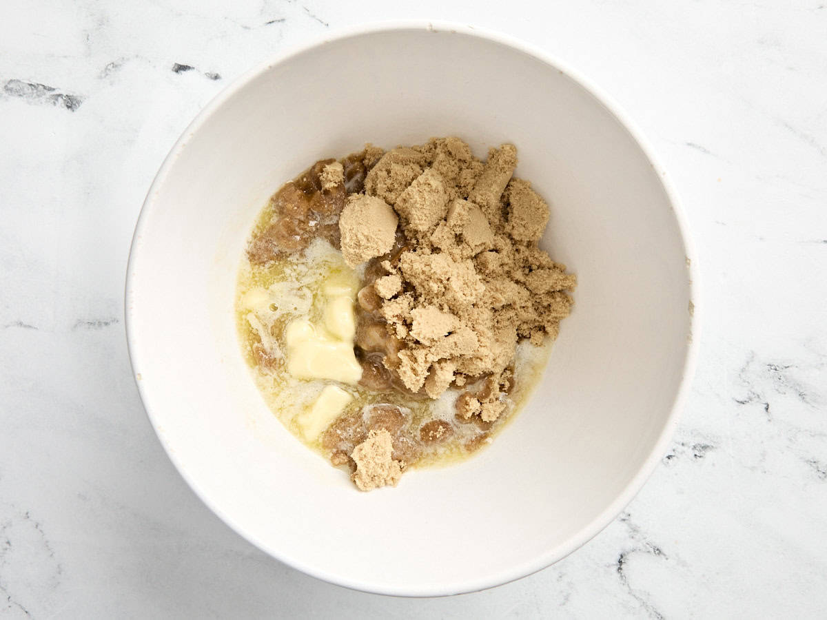 Butter and brown sugar in a mixing bowl.