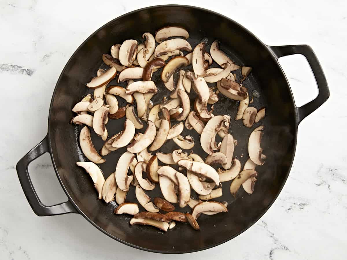 Mushrooms added to skillet.