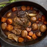 Overhead view of a pot roast in a dutch oven.