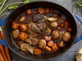 Overhead view of a pot roast in a dutch oven.