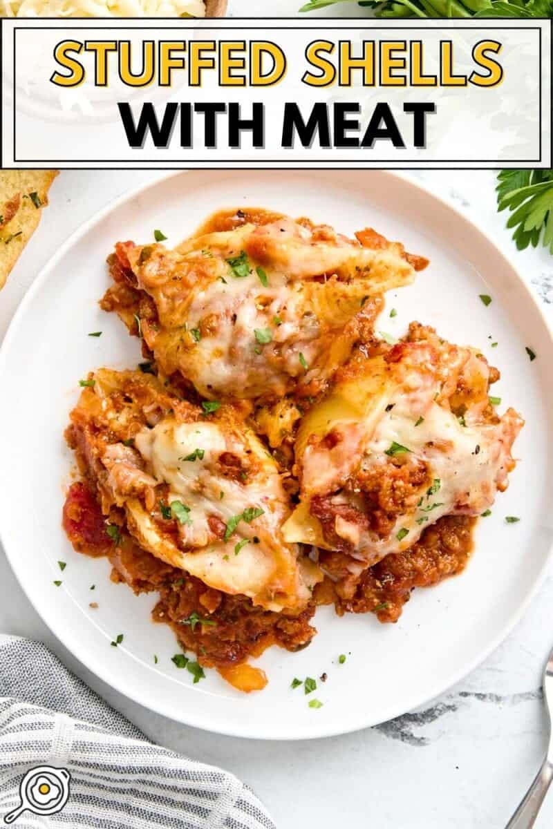 Overhead view of stuffed shells on a white plate with title text at the top.