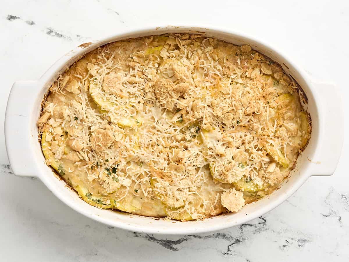 Baked squash casserole in a casserole dish.