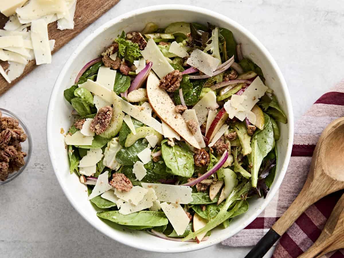 Overhead view of pear celery pecan salad in a serving bowl.