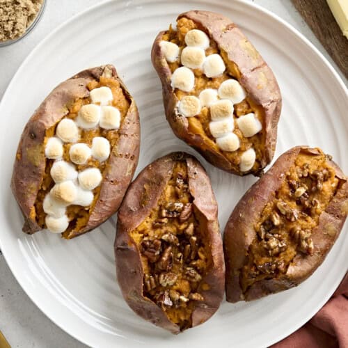 Overhead view of Twice Baked Sweet Potatoes on a white platter.