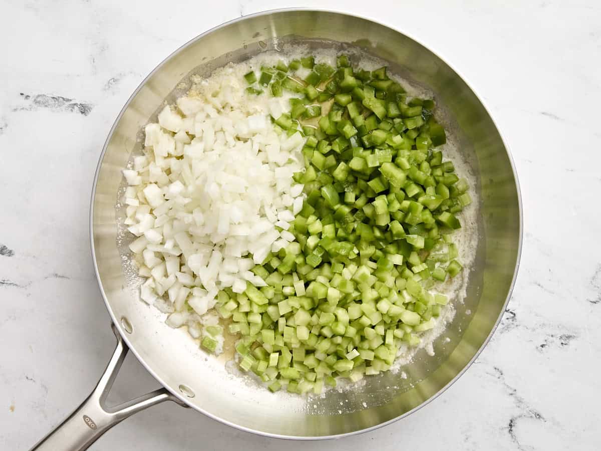 Diced celery, onion, and bell pepper in a large skillet.