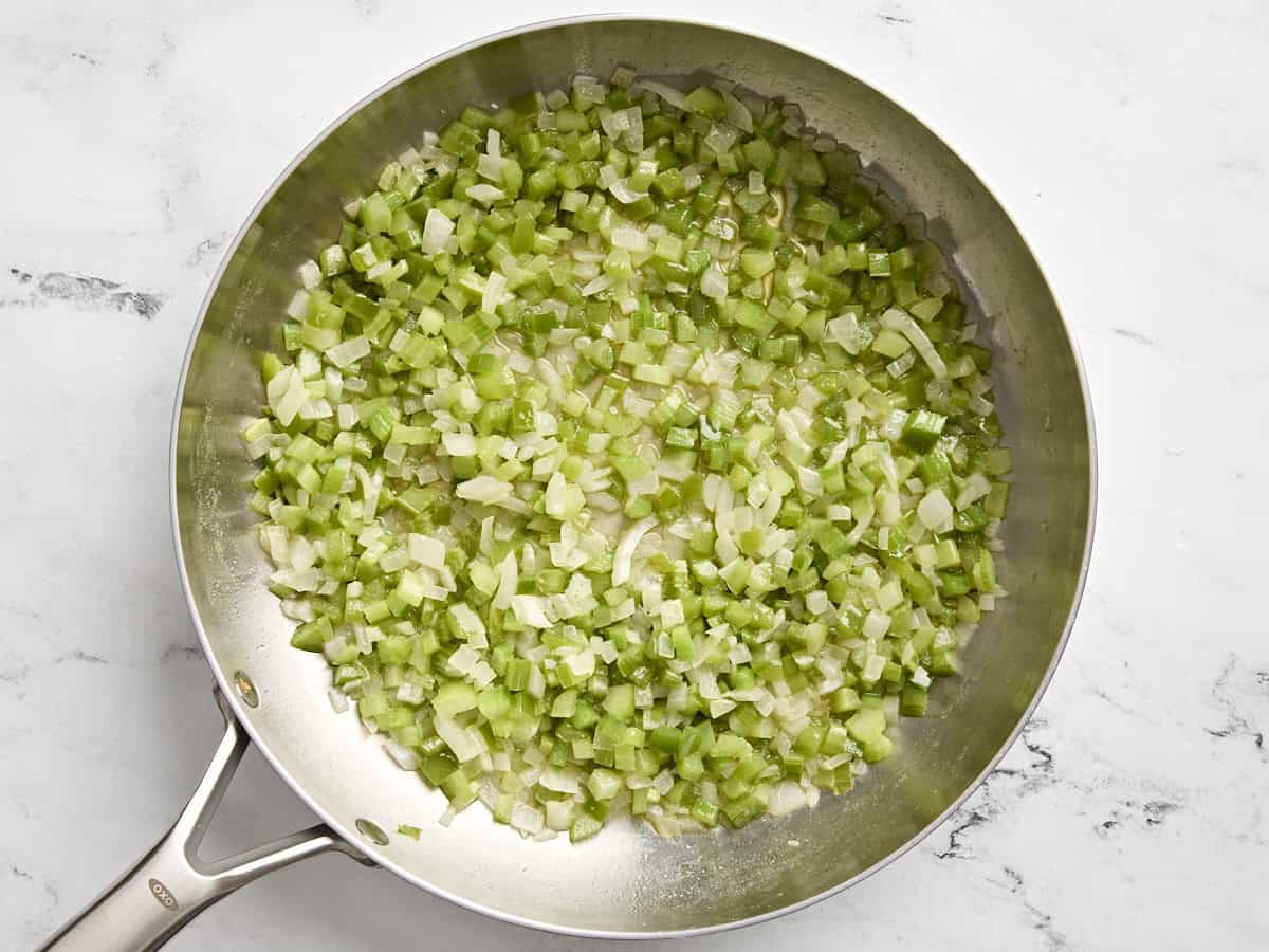 Sautéed vegetables in a large skillet.