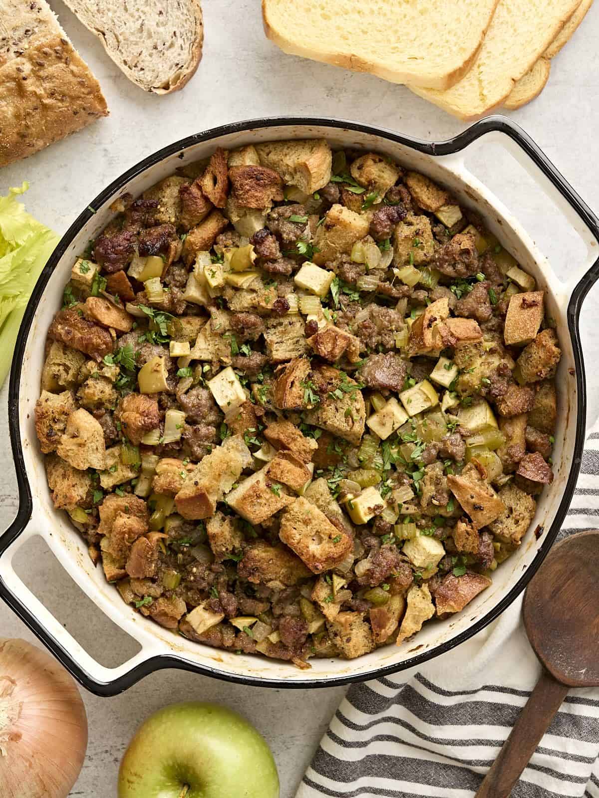 Overhead view of sausage stuffing in a casserole dish.